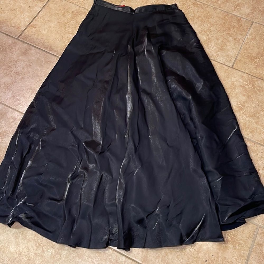 Black long maxi skirt with attached mesh slip.